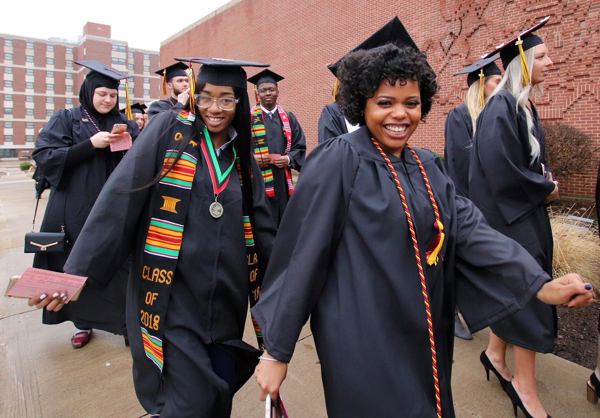 BloomsburgU's tweet photo. "I have a memory of me sitting here over 20 years ago when my best friend graduated. (Today) I see her courage, knowledge and kindness; and I believe these qualities developed while she was here." β Molly Marnella, Ed.D. πππΎ #BUClass2018 #HuskyPride π·: https://t.co/B9TtbJKWrU https://t.co/7cNUS728a9