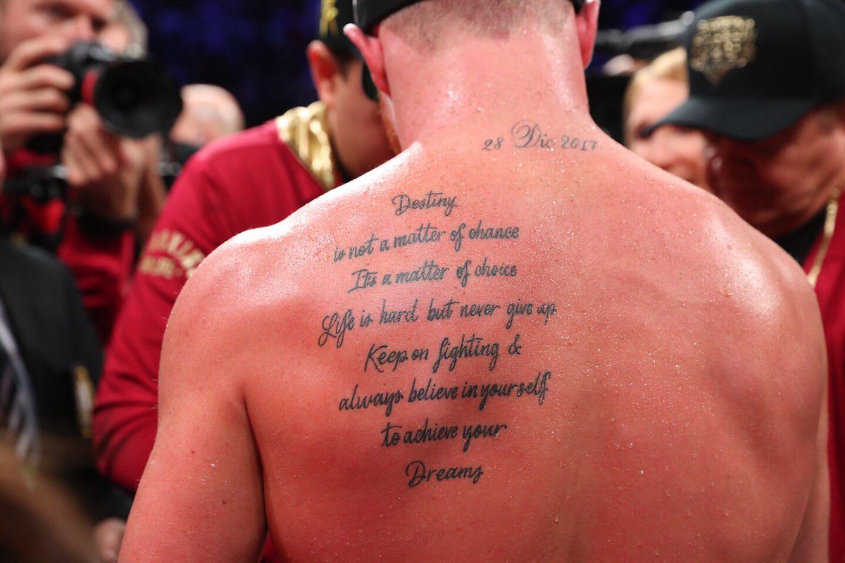 Tattoo'd text on Canello Alvarez's shoulder. 