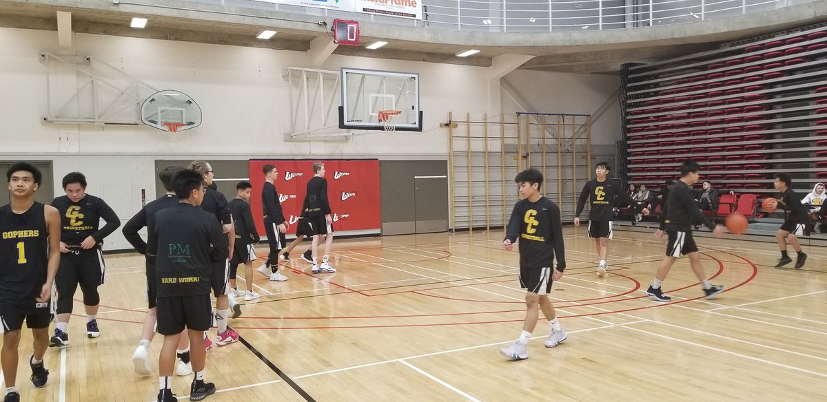 TeacherAndrade's tweet photo. After defeating Maples Collegiate 60-46 , the @GC_Gophers JV boys basketball team is warming up for their semi-final matchup against Dakota Collegiate here at the U of W Wesmen Classic! Good luck boys! @basketballmb https://t.co/Oqzh44Yckk
