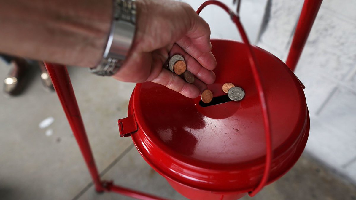 wsbtv's tweet photo. Another gold coin worth $1.2K left in Salvation Army Red Kettle https://t.co/AmikRhblbO https://t.co/ZOHDww984J
