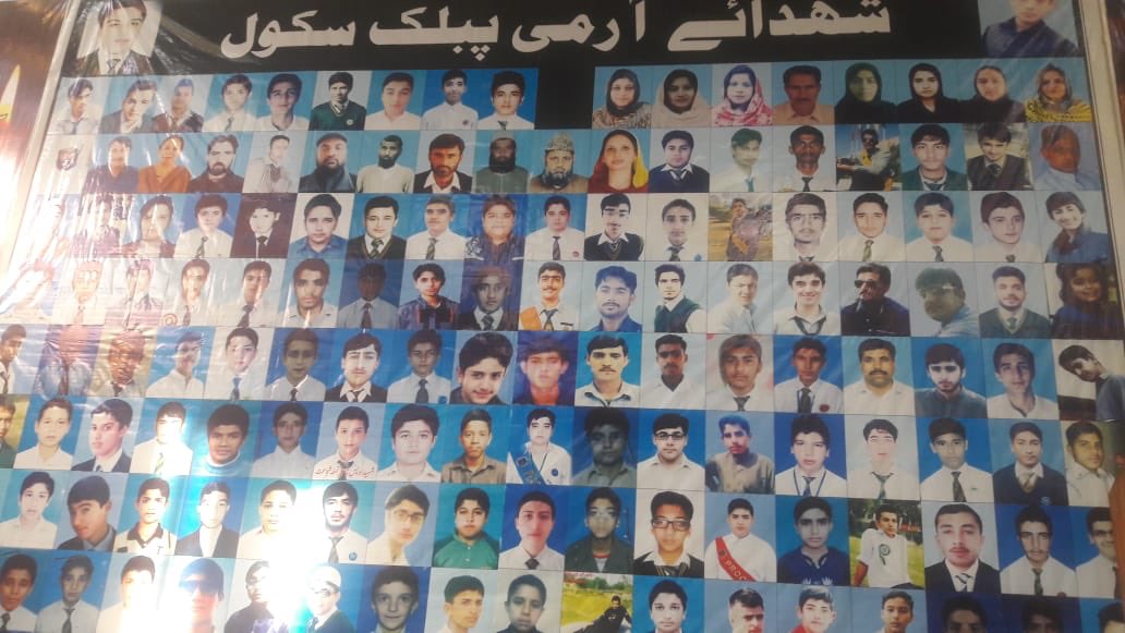 voadeewa's tweet photo. #APS2018: “We don’t want songs, prayers or consolations,stop hosting the murderer”, reads a poster of terror outfit TTP ex spokesman at a commemoration ceremony of #APSPeshawar on Sunday. @ImranKhanPTI said Sunday his govt “will implement NAP 2 rid Pak of all forms of terrorism”. https://t.co/hIty5Agnlc