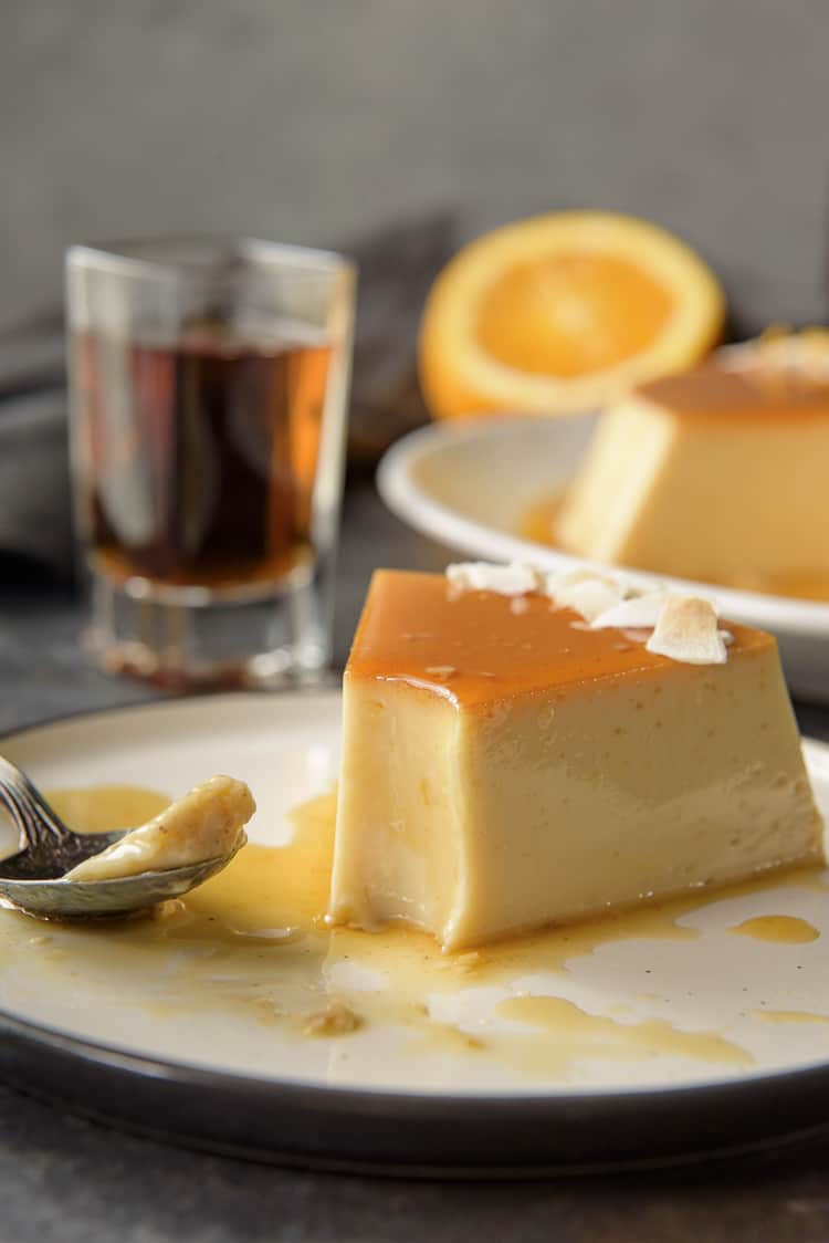crumbykitchen's tweet photo. You don’t have to be on a tropical vacation to enjoy a slice of this silky-smooth Orange Coconut Flan – it’s just as easy to make at home! #ad #holidayrecipes @NestleLaLechera https://t.co/HuZRkQXZkw https://t.co/yTJKAUhc2q