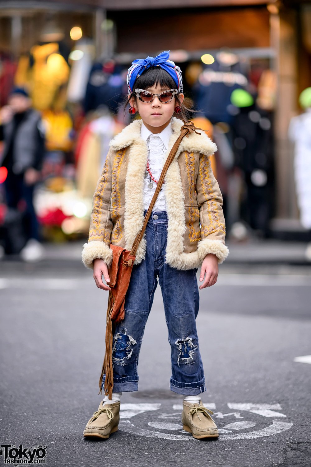 Tokyo Fashion 6 Year Old Japanese Student Rino On The Street In Harajuku Wearing A Vintage Look From Kids Vintage Boutique Honey Supply Including A 1970s Coat 1950s Jeans Vintage Fringe Bag