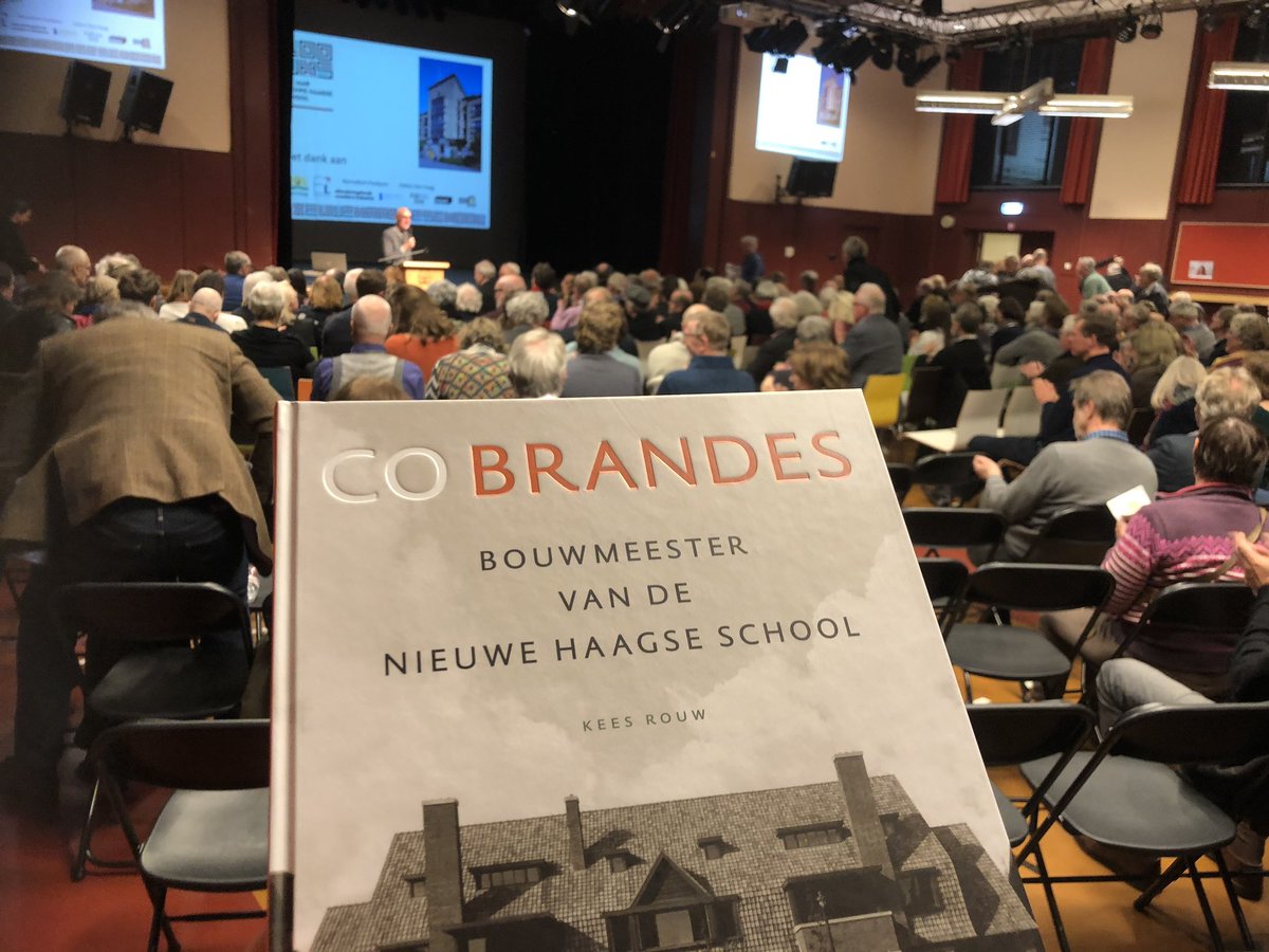 RvanAsten's tweet photo. In het van zijn tekentafel afkomstige prachtige Dalton College het boek over Co Brandes in ontvangst mogen nemen van @NHS100jaar. Prachtig boek over deze “Bouwmeester van de Nieuwe Haagse School” #erfgoed #denhaag https://t.co/jqO3ch5wDJ