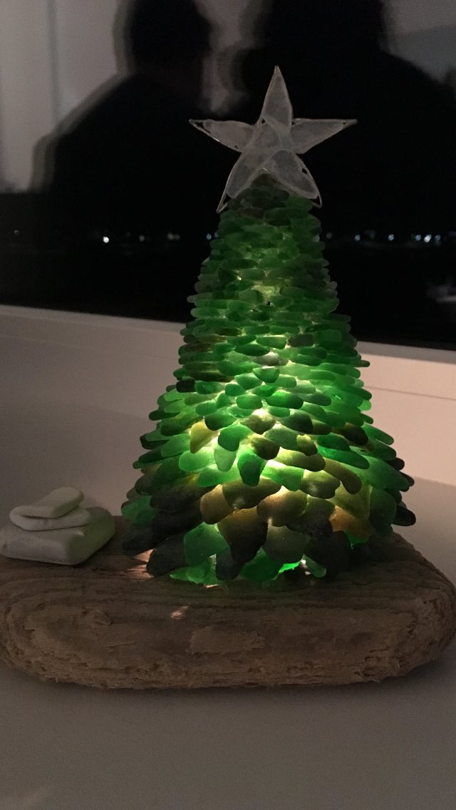 DeliMamas's tweet photo. @SolitaNQ Does this count? On holiday this week in Angelsey so brought it this with us to enter the festivities.  I made it last year out of sea glass and drift wood from the beaches here 🎄 https://t.co/f6HaLtpqqP