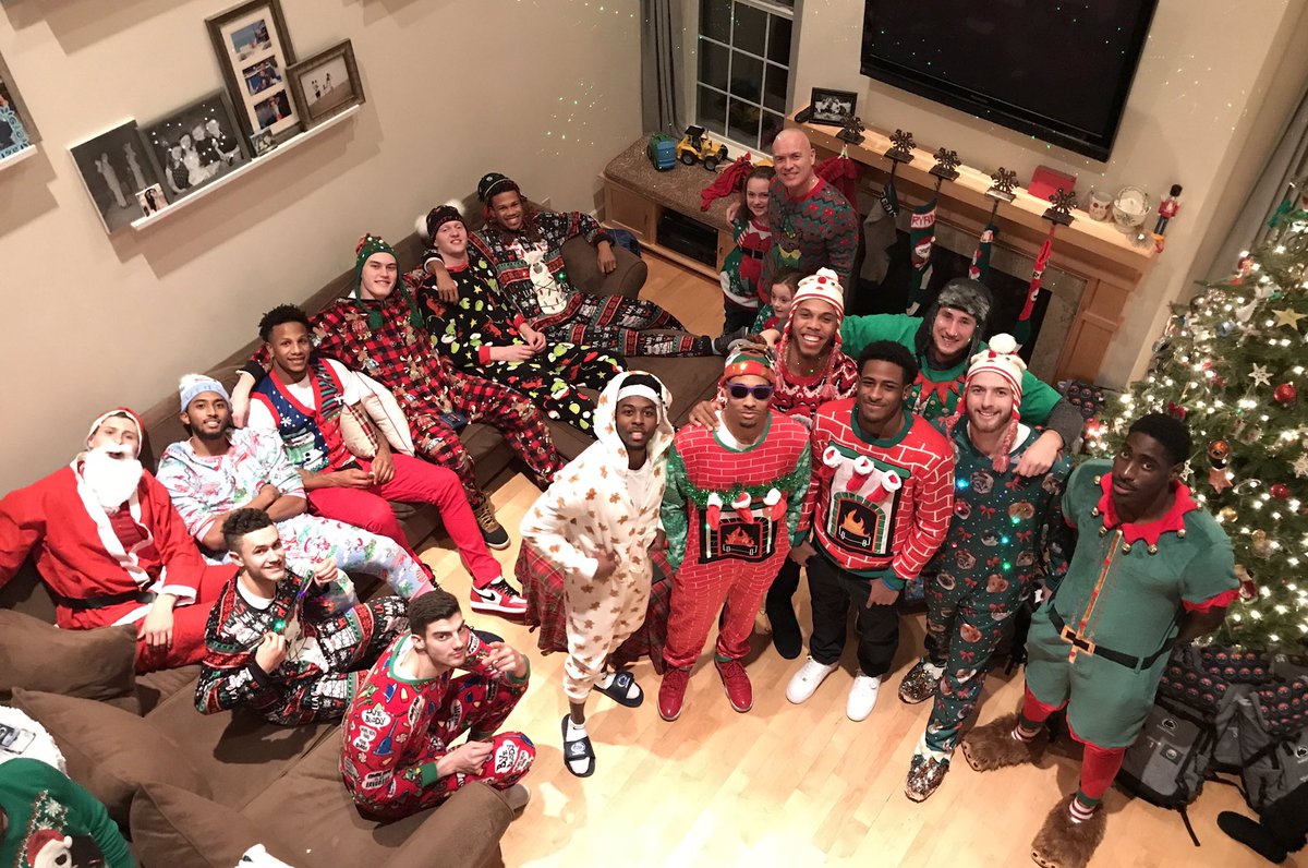 PennStateMBB's tweet photo. Holiday traditions — annual dinner 🍖🥙at @Coach_Chambers with his family, white elephant gift exchange 🎁 &amp; ugly sweater contest!🎄#climbwithus 🔵🏀⚪️ https://t.co/BG0Th4WZQG