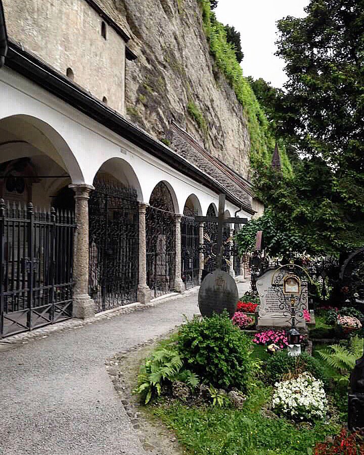 sis_adventures's tweet photo. Watching @soundofmusic - our favorite movie! We were lucky to visit Salzburg several years ago &amp; visit all the Von Trapp sites. This is St. Peter’s monastery and cemetery. This is where they hid in the dark  before escaping! #climbeverymountain https://t.co/O0bGLb6iOl