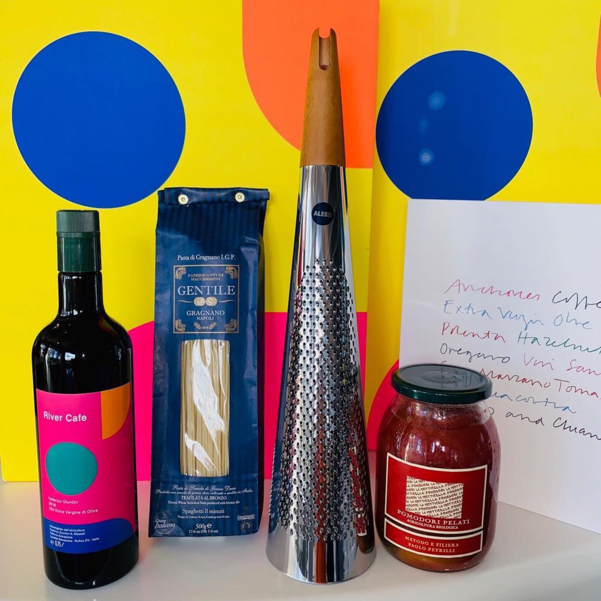 New River Cafe Gift Box for £120. Includes our 2018 Olive Oil, an Alessi Cheese Grater, a jar of Pugliese tomatoes, Gentile spaghetti, and the recipes we love most in our special book ‘10 Ingredients’.  
To order email giftboxes@rivercafe.co.uk