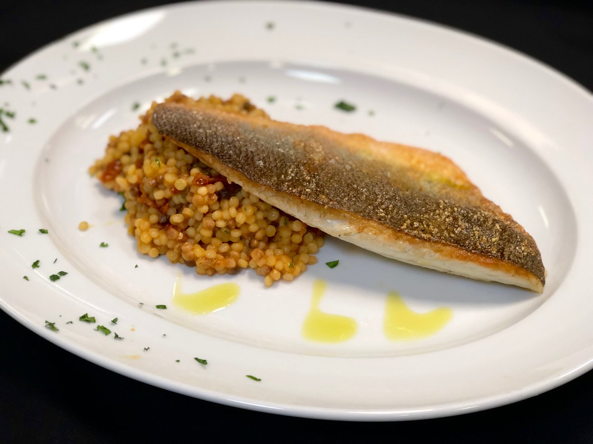 OlivoGroup's tweet photo. A relatively healthy start to the week..pan fried sea bass fillet served with an amazing combo of sardinian fregola sautéed with sun dried tomatoes, chilli & garlic #spoton 👌🏻#olivomare #decembermenu @CasadelGrano https://t.co/2J78NhzwZ9