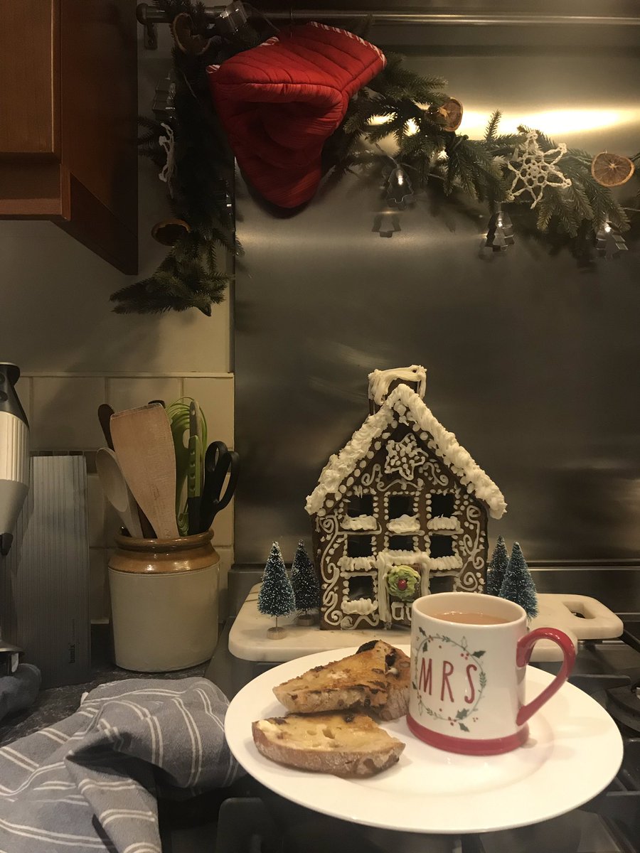 ktblunty's tweet photo. Sometimes all you fancy after work is a good cuppa & hot, buttered Christmas sourdough toast for tea 😋 amazing and packed with cranberries & raisins, perfect! #triedandtasted whatcha think of my gingerbread house then? @mycoopfood #festivekitchen #watchoutnigella https://t.co/abUttoY7ZL