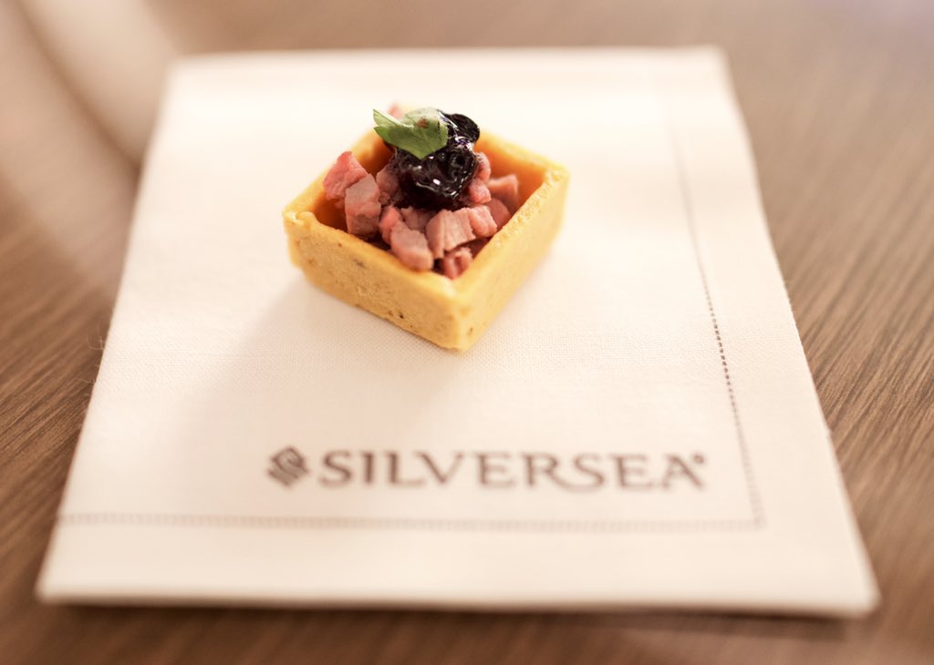 visitwithus's tweet image. The difference is in the detail. Take a look at this duck canapé, a miniature culinary masterpiece, resting on a white linen napkin, is the kind of attention to detail we are experiencing on board @silverseacruises #silverspirit. #thisissilversea #inpartnership