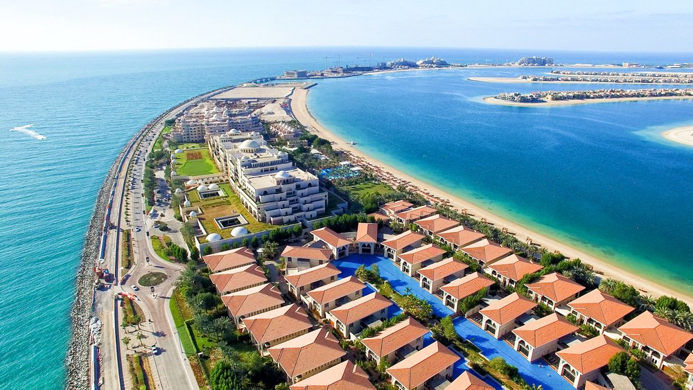 SweetSoHomes's tweet photo. The artificial Palm Islands are a must-see when visiting #Dubai. #travelmore  https://t.co/BwrVZCtHqv https://t.co/q6WFZExfKo