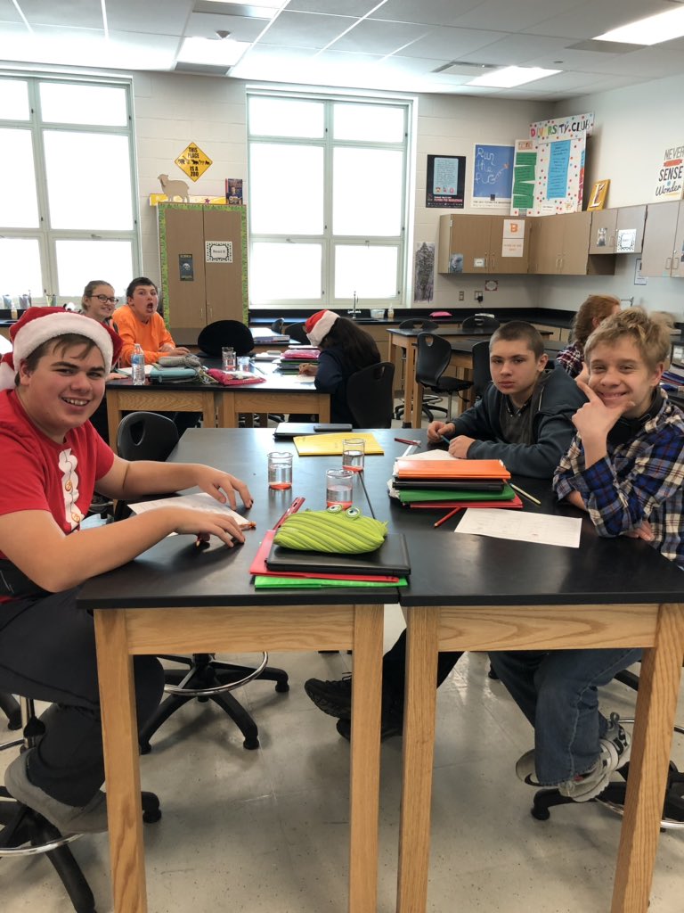 Elements of Science students review the scientific method by testing which temperature of water causes candy canes to dissolve faster.