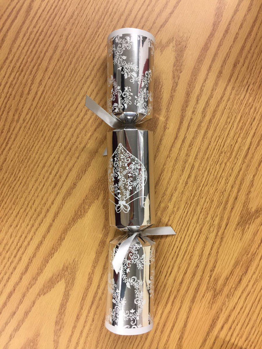 IUP_Janice's tweet photo. Super excited about my first ever Christmas cracker!!! I have the best colleagues. #iupstaffprops https://t.co/5PEyOeNyr7