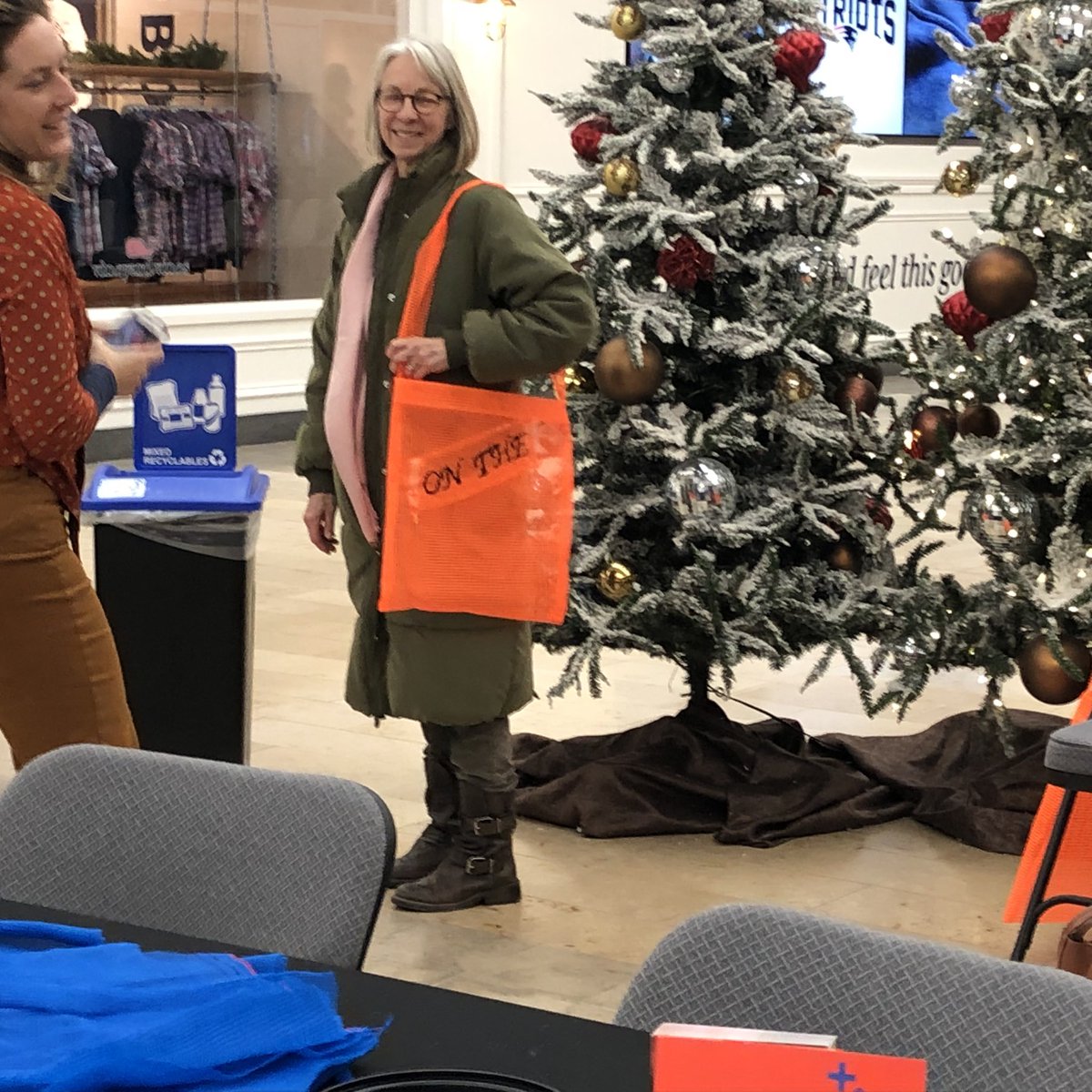 KGilbertStudio's tweet photo. It’s the magic hour for #UnlessBOS at the Pru. 📸 Come see and join @now_and_there as we upcycle @S_Cardon’s monumental artwork commissioned by @SustainableBXP. #totebags #handmade #bepartoftheart #stockingstuffer https://t.co/2PcZBqUDNt