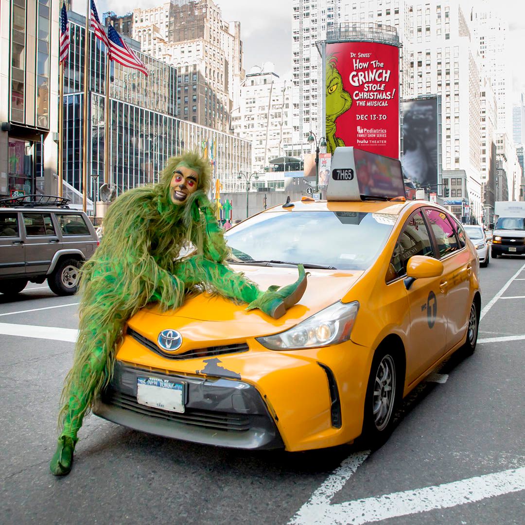 nyctourism's tweet photo. The Grinch has arrived at the @hulutheatermsg and he’s plotting to steal Christmas from NYC! See him on stage in Dr. Seuss' How the Grinch Stole Christmas! The Musical—playing through 12/30. Save up to 35%* on tickets with the code NYCGO at https://t.co/ZLwSrR9JE0 https://t.co/sMAVdi5leY