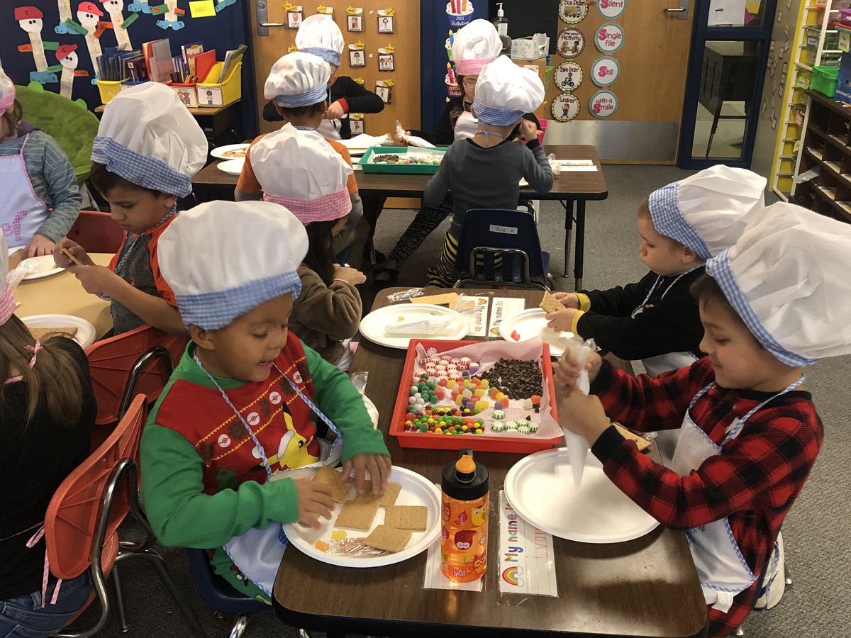 Ms. Hicks Kindergarten students making gingerbread houses today!!! Their hats are too cute !! #WPSproud #WPSFutureReady #EnterpriseEagles