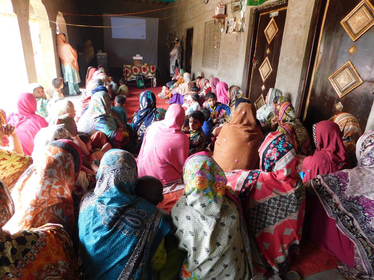 rwaqar's tweet photo. Our teams screening stories of most significant change in rural Sindh. Community members are gathered from different villages & shown participatory videos made by mothers, aiming to trigger community dialogue on barriers & pathways for Behavior change #SBCC #behaviorchange #PVMSC https://t.co/G0akmLDJD5