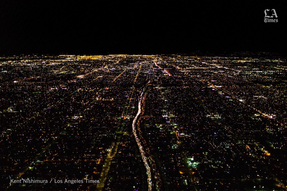 I’ve flown into <a href="/flyLAXairport/">LAX Airport</a> at night countless times this year alone, almost always returning from an assignment for the paper, and this view flying over the City of Angels, never gets old. It just seems to stretch on towards infinity. #travelingkent