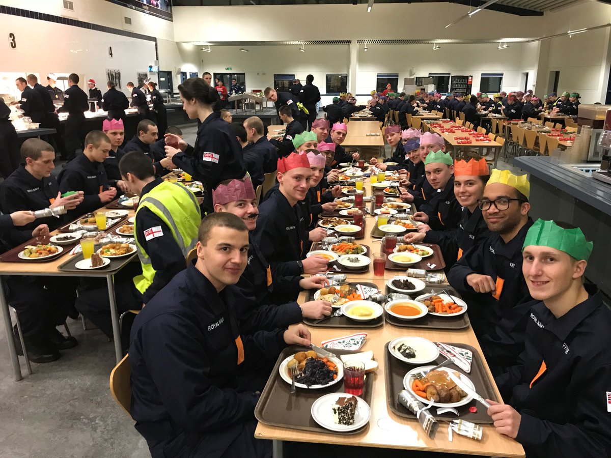 HMS_Raleigh's tweet photo. Last night was Christmas dinner for the recruits, phase two trainees and ship’s company junior ratings, served in true Naval tradition by the Officers serving at HMS Raleigh #christmas #yulethewaves https://t.co/1QGEDsC2ps