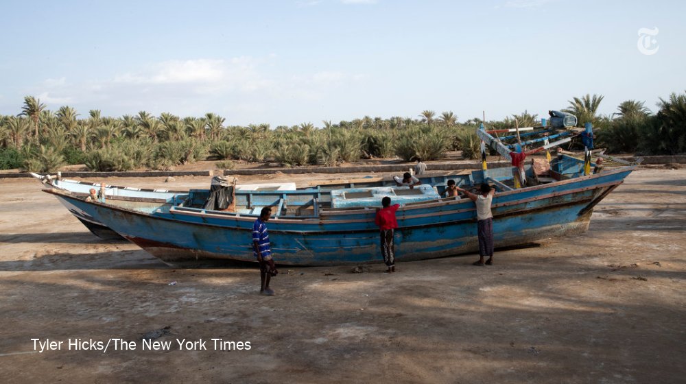 "We held up fish to show we were not a threat," said a man who clung to an upturned boat as it was being attacked by a helicopter. But the gunner "kept firing," he added. https://nyti.ms/2EuMoc7