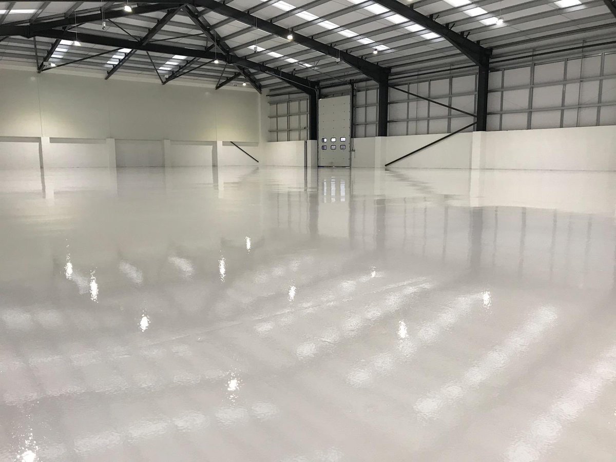 Latex, adhesives and coatings removed prior to repairs, priming and epoxy finish. Another quality finish by the Britannia team.   britanniaindustrialflooring.co.uk