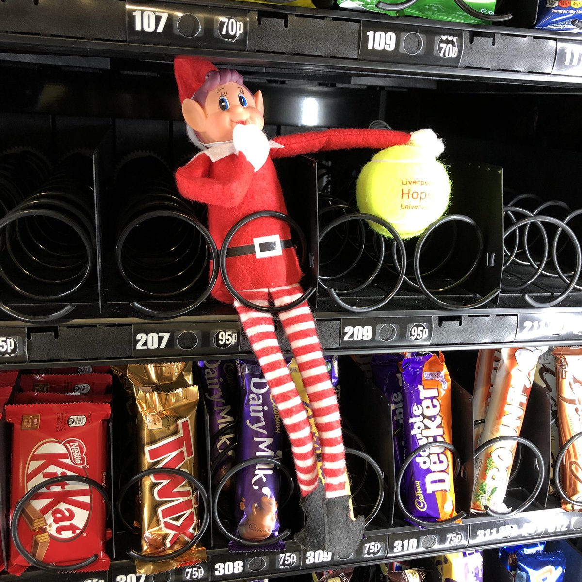 eatatHope's tweet photo. #GarytheElf snuck right by the @HOPEPARKSPORTS team today 🎾 He stole one of their tennis ball tree decorations and locked it away in the vending machine! https://t.co/zsWXGLBxiC