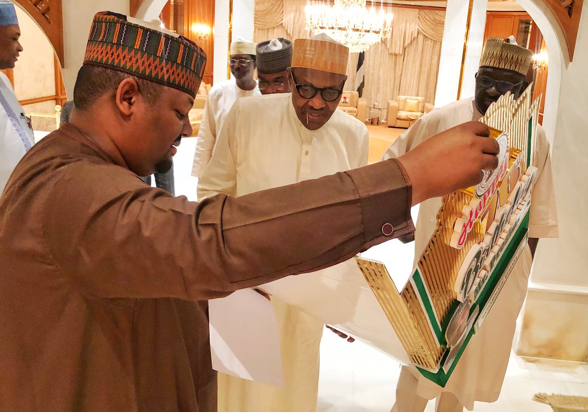 BashirAhmaad's tweet photo. Last night, Barr. @IsmaeelAhmedB (SSAP), presenting a Birthday Card to President @MBuhari on his 76th birthday, on behalf of the millions of beneficiaries of Social Investment Programme.
Mr. President appreciated the gesture deeply. #PMBAt76 https://t.co/qlwTxu5Cg9