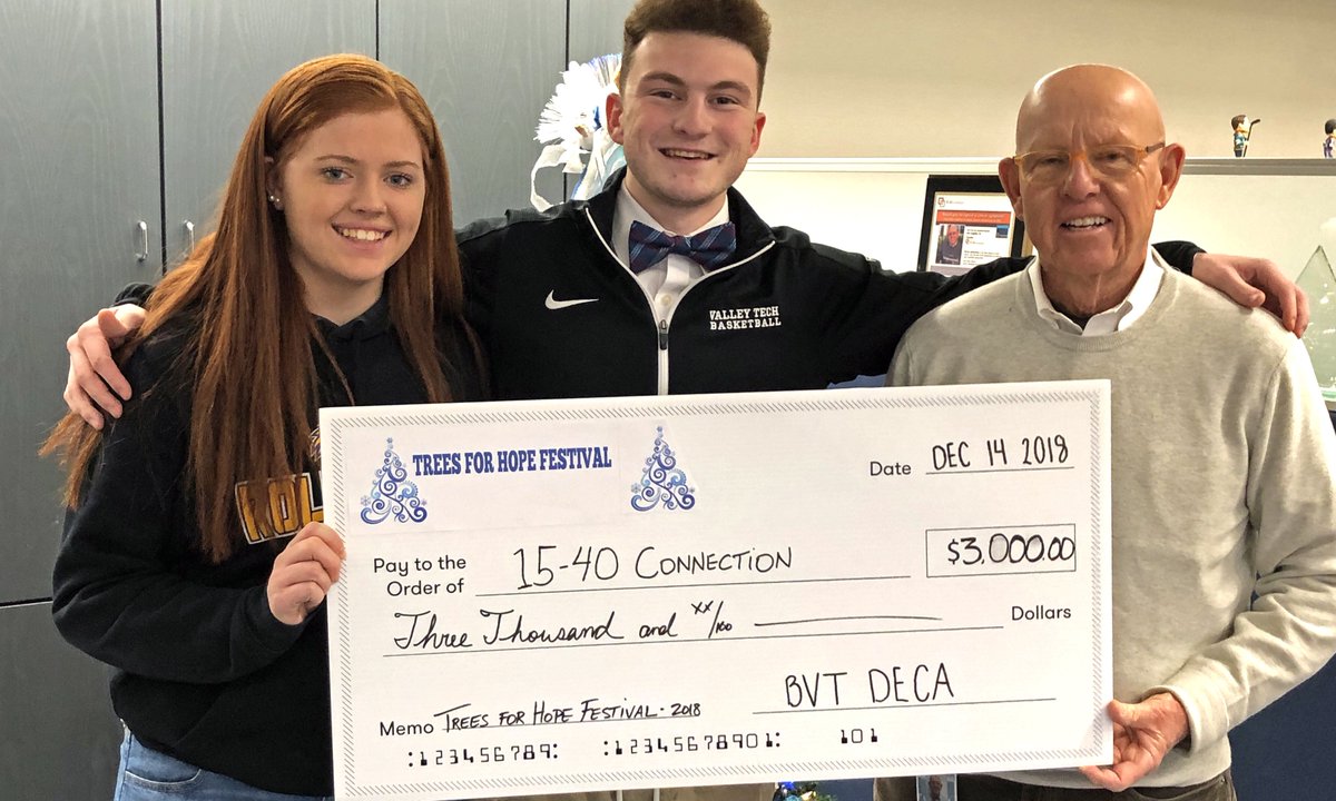 Incredible work by <a href="/BVTHighSchool/">BVT</a> DECA, which organized the Trees For Hope Festival at St. Gabriel's Parish in Upton, MA. They raised $3,000 to support our early cancer detection education programs. Pictured are Katie Hauskeeper &amp; Andrew Floyd with 15-40 founder Jim Coghlin Sr.