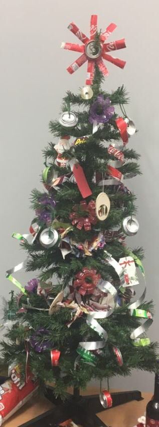 QUBAlumni's tweet photo. We just love our @greenatqueens Christmas Tree 🎄 decorated using recycled cans and bottles, bits of wood plus fabric &amp; gift tags! Nice one Shelley #MerryXMas @QUBAlumni @QUBelfast #SwitchOffQUB #LoveQUB @QUBstaff @QUB_QGA @NatashaQUB @BBCMarkSimpson @tgeducation @qubgradschool https://t.co/K9ej9sSwvZ
