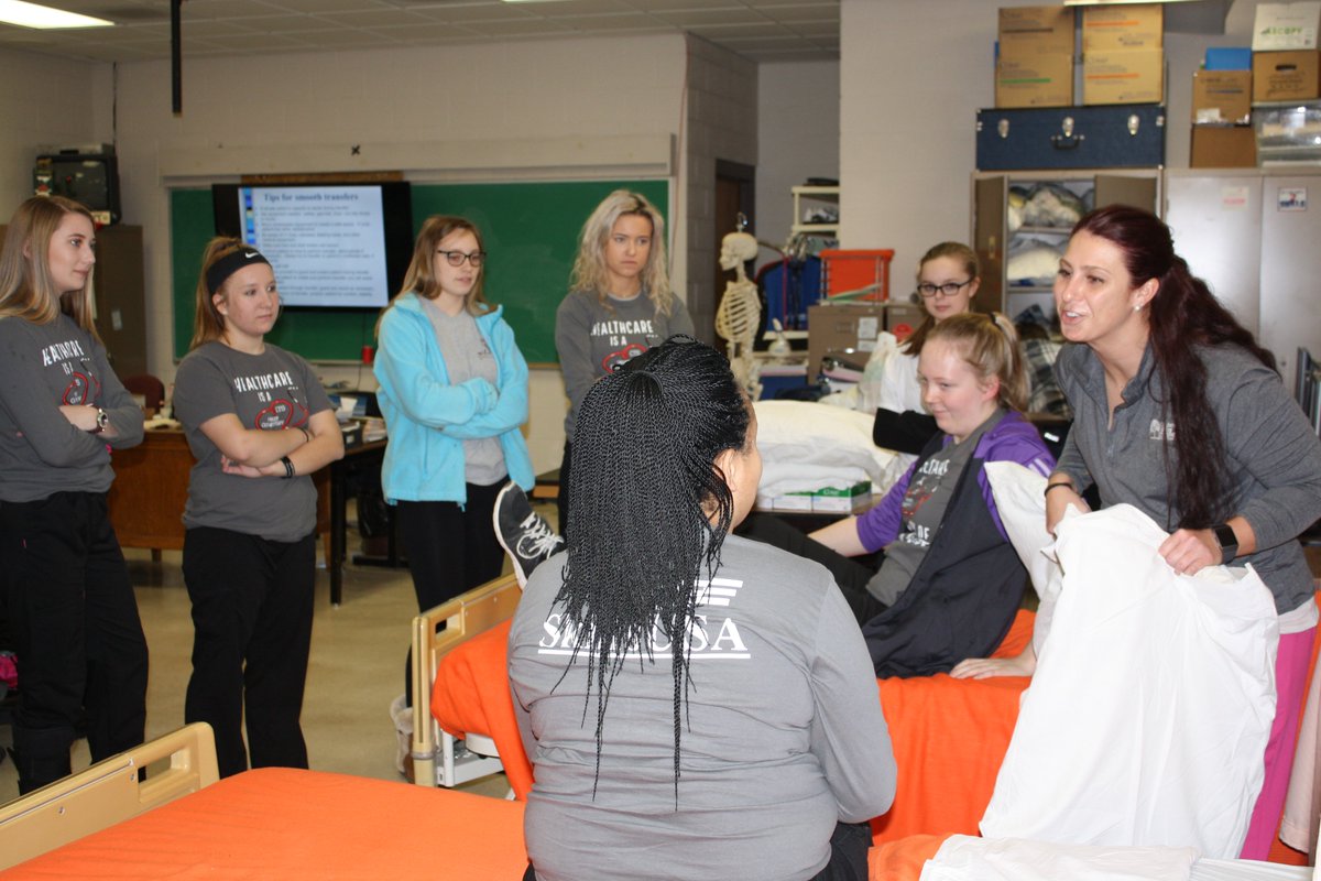 Health Occupations students learn about transferring patients and other patient care guidelines from Dr. Jacque Winter.