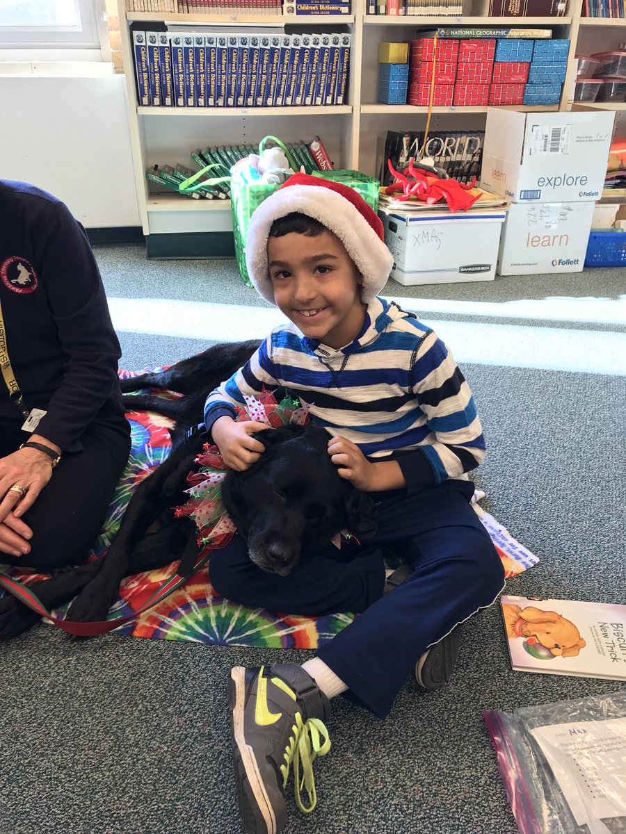 Reading dogs in the library! <a href="/ArborViewSchool/">Arbor View School</a>