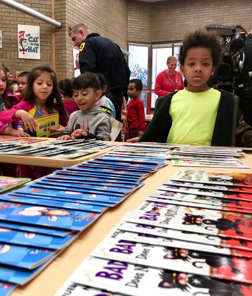 jacksonlibrary2's tweet photo. We had a great visit by @slcpd to our library. A gradewide read aloud led by SLCPD’s finest followed by students choosing 3 books each. @jacksonlibrary2 @slcschools @slcsdltt https://t.co/U8xNRVrVLa