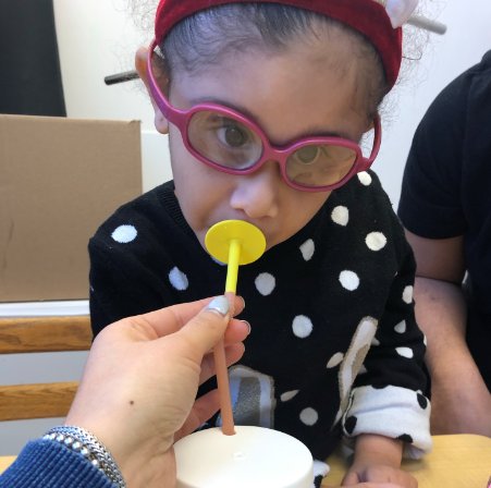 Way to go! Today in speech therapy, Emilia used a lip lock to help her enjoy this yummy smoothie from a straw! She has been working so hard participating in oral motor exercises, and now all of her hard work has paid off! Great job, Emilia 😀