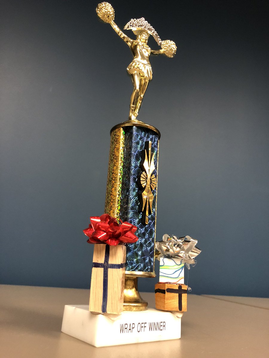 homeownersfg's tweet photo. Today's #WrapOff was between Licensing Compliance Specialist Lisa Gates and Manager of Business Services Rose Dinglasan. They each wrapped 3 presents and we held a Facebook vote to select the winner.
Congrats to Lisa Gates on winning the contest and the trophy! https://t.co/mRkvo6OSkJ