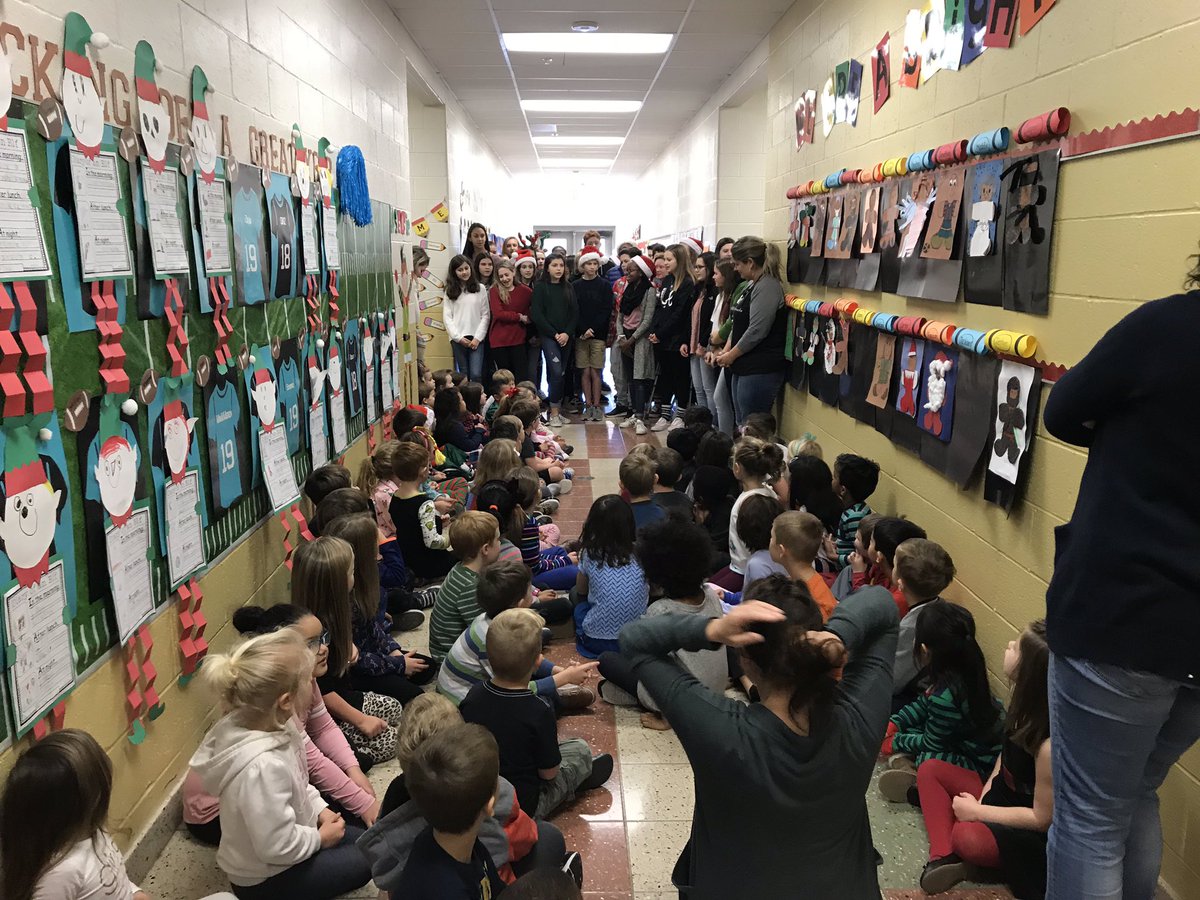 PKESAAP's tweet photo. Thanks @DeniseBard4 for bringing your incredibly talented 8th grade honors chorus caroling today at PKES! You spread tons of holiday cheer through our school! Great idea @CoriHustedt! @PK_Knighthawks @PKESAdmin @PKESAP #PantherEngaged #inspired https://t.co/KdCjVK0mCm