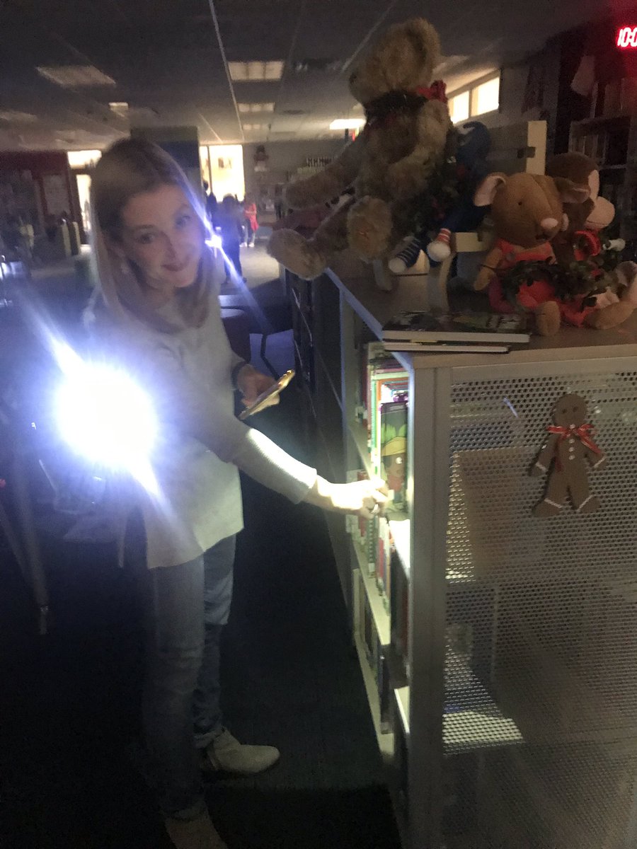 mellyherbs's tweet photo. Reading in the Dark...one of our favorite pre-holiday activities! Getting to read anywhere=legs sticking out from under my desk. We had a mom volunteer to shelve books in the dark with her flashlight, what a great sport with a sense of humor! #librariesinrisd #RISDConnects https://t.co/xTDPO2VGiL