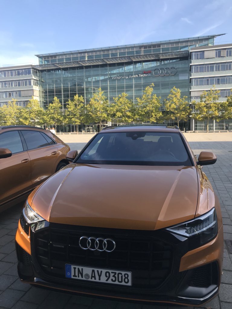 JezzaMaqasa's tweet photo. Here I was minding my business in #Ingolstadt home of @AudiOfficial , I met up with two beautiful and aggressive looking SUV/Coupes, #AudiQ8 in the #50TDI Quattro guise. The Dragon Orange color stands awesomely in these well sculptured wheels. Come 2019 @audisouthafrica #Q8 https://t.co/FZxZEJ6IsC