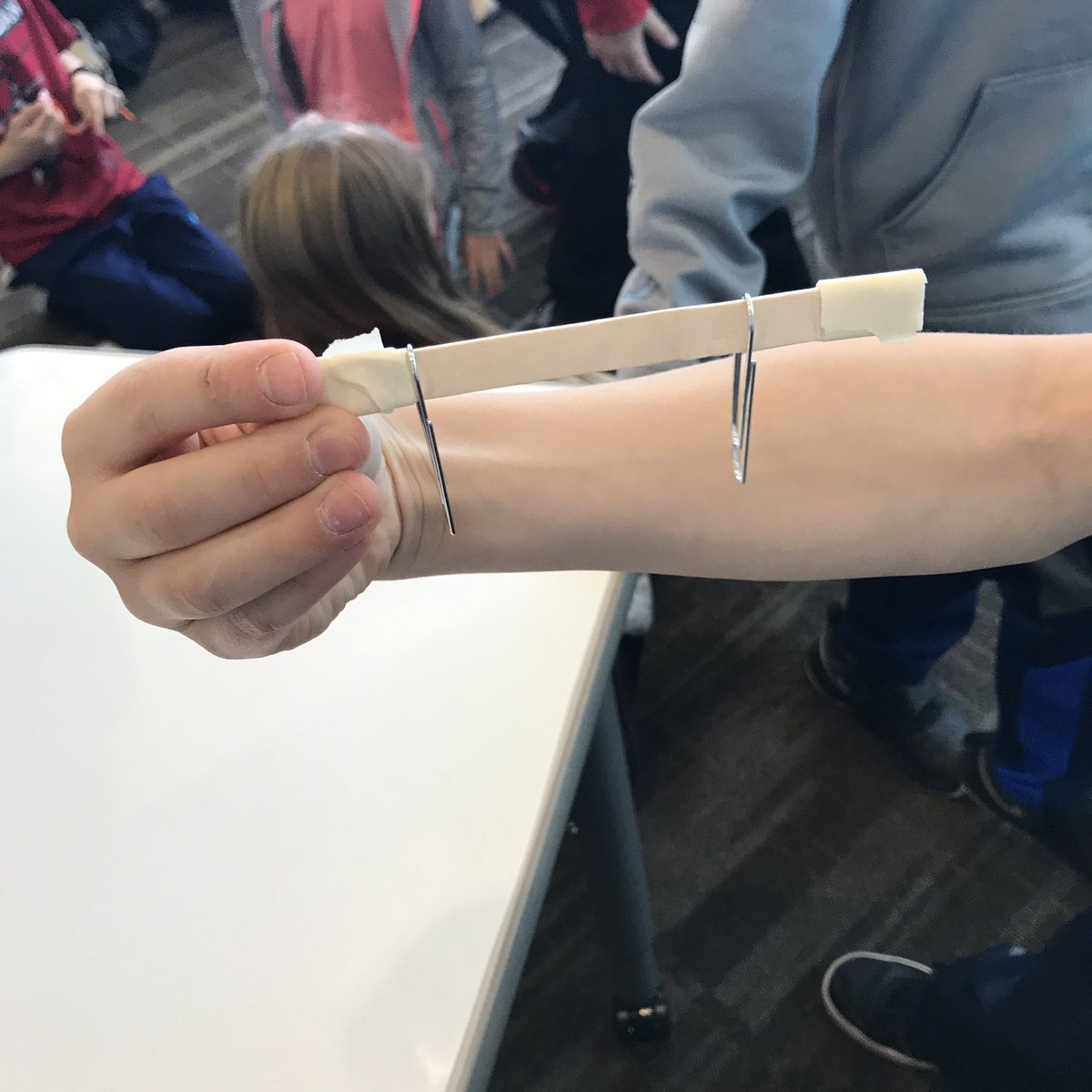 You see pipe cleaners, craft sticks &amp; tape. He sees a communication device that measures the vibrations of your vocal chords to send messages to an ear receiver via radio waves on Mars where sound won’t work. Love his thinking!! #instantchallenge #WSEsteam <a href="/WSELibrary/">Wolf Springs Library</a> <a href="/WSESymes/">Miss Symes</a>