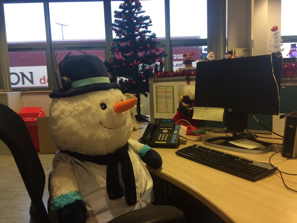 TraceyAvCDC's tweet photo. #Steviethesnowman has enjoyed helping us out today. Counting our Christmas sweets, answering phones on the Help Desk, making friends with Santa and loads of cuddles. ❄️💙❄️ https://t.co/c1ZikfV0uq