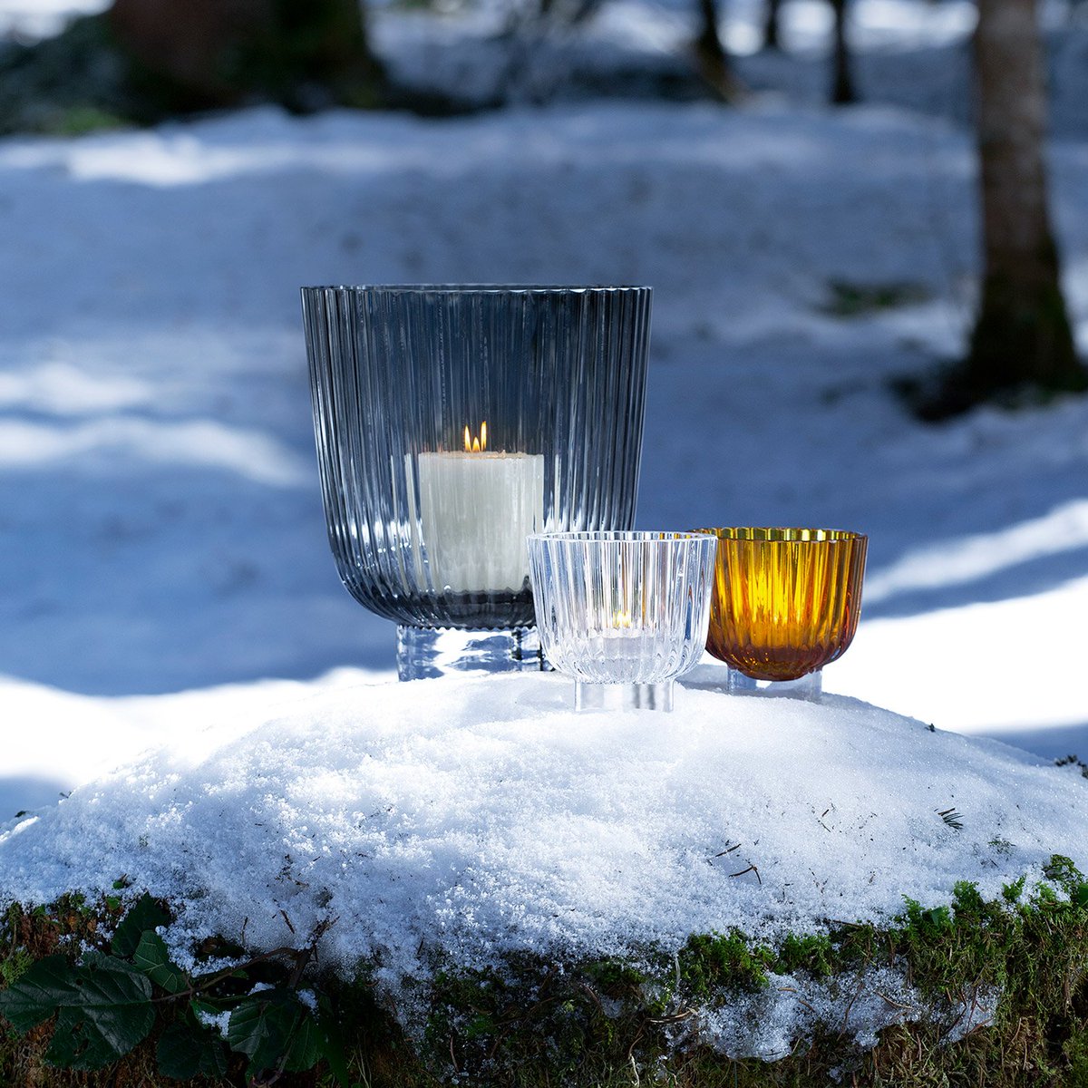 Inspired by the draping &amp; gathering of fabric, these handmade lanterns &amp; tealight holders have a pleated texture which diffuses candlelight &amp; casts soft shadows. Cluster different sizes together as a table centrepiece, or display a solitary tealight holder for warming ambience.