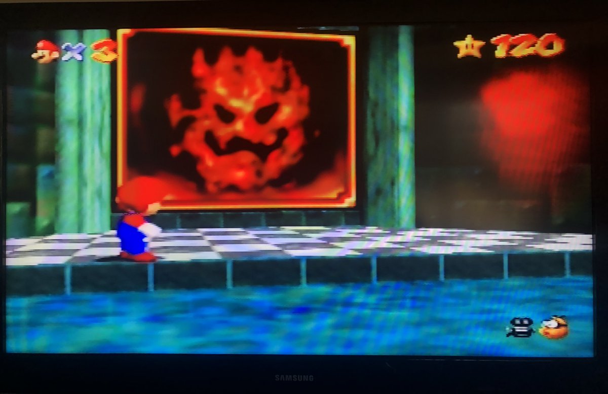 we’re not going into this level yet, but you have to pass this painting to get where ur going. who is this? its not bowser, and this enemy doesnt exist on this level or anywhere in this game. guess its just a random fire demon or something they made up for no reason