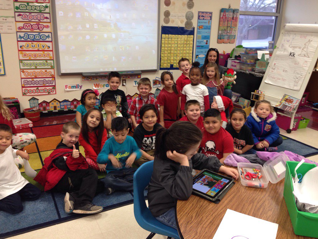 kinderharl's tweet photo. We found the elf!!#nes123. #cosreds. He loves to read https://t.co/nM9YVJ9WYT