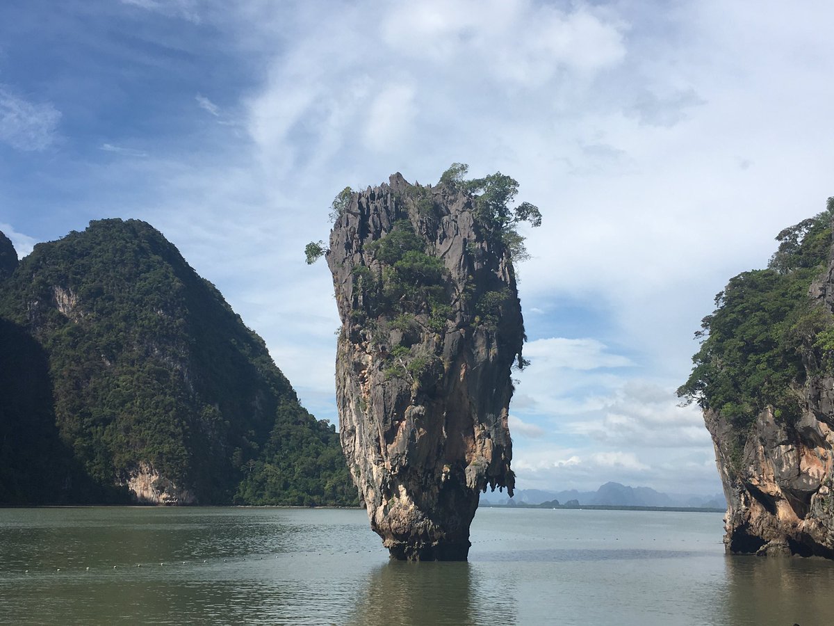 vancitycea's tweet photo. No bid deal, just hanging out at James Bond Island. Named for the Golden Gun movie. Clever English translation to get all ‘em tourists! #jamesbondisland #thailand https://t.co/kztrX2Pp86