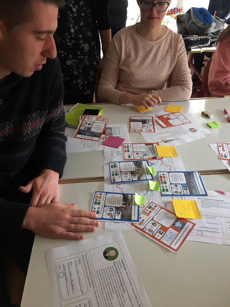 LydiaCumiskey's tweet photo. Just had a great day teaching civil engineering students at Sarajevo university for my @EUErasmusPlus #NATRISK @FHRC_MDX staff exchange! They loved @WaterYouthNet #FRM game and #creativenetworking to discuss non engineering solutions &amp; implementation challenges ✏️✂️💧🌊🌿🏠 https://t.co/u35ERX4PQV