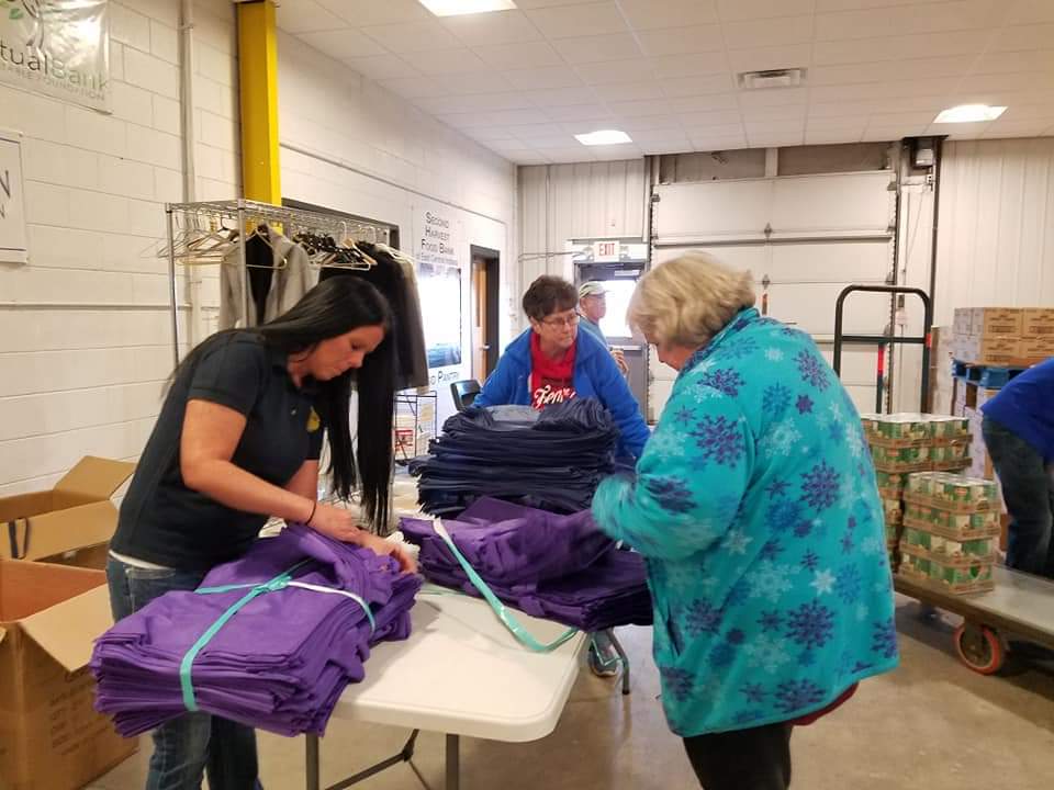 INRevenue's tweet photo. Team members from the #INDOR Muncie District Office donated 21.5 hours of personal time packing non-perishable food into bags for the Southside Panther Pantry. The pantry provides food, clothing, and other essential items for students who are in need. #DORGivesBack #NextLevel https://t.co/PJF4QsmS8m