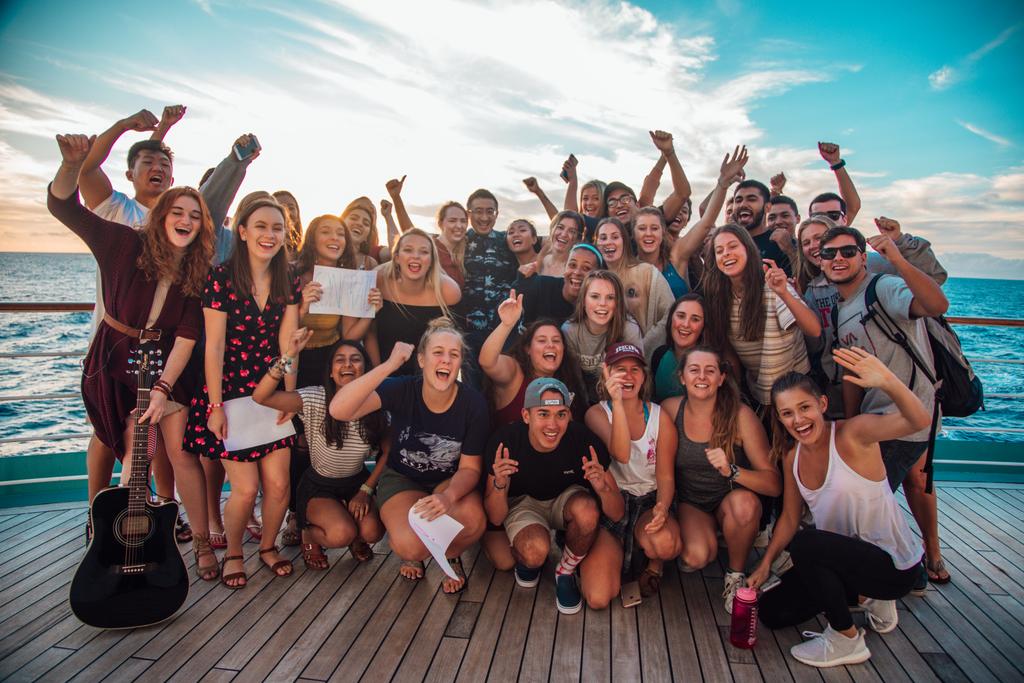 SemesterAtSea's tweet photo. Sometimes the end of a voyage leads to the beginning of a new journey. β£
β£
With the help of his students, Religious Studies Professor Dr. Kaiqi Hua proposed to his partner Heather Borgard during a beautiful sunset at sea. She said yes!β£
#sasfa18 #semesteratsea #engagement https://t.co/dfYBO4PHVn