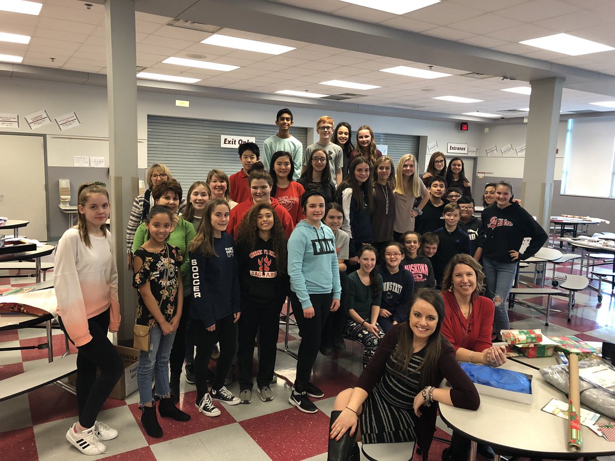 erin_wehr's tweet photo. Elves @OrefieldMS are busy wrapping gifts for our district families  at our Adopt-a-Family event! #ParklandPride #orefieldms https://t.co/eez1ObEQr9
