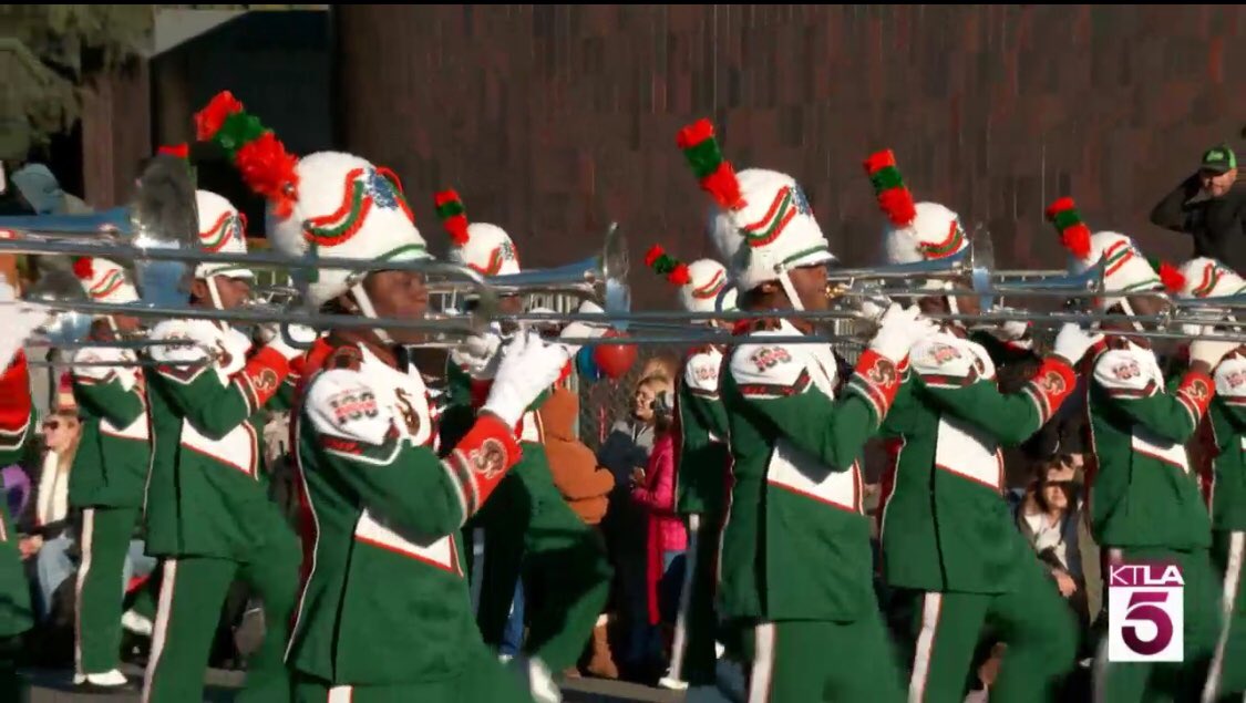 FAMU_1887's tweet photo. The Marching 100 captivated millions as they performed at the 130th @RoseParade! View photos from the performance below. #FAMU100RoseParade https://t.co/tiGsWS0Mro