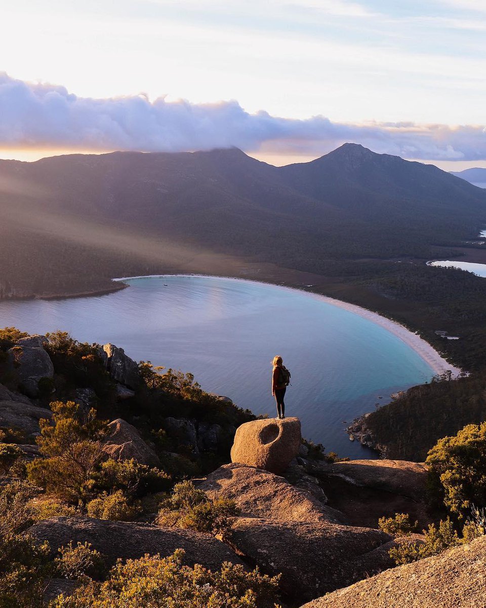 Australia's tweet photo. Start the New Year feeling on the top of the world! 🙌🏼 
Well, on top of @tasmania’s #MtAmos, at least. (via IG/wildroadwanderers in #FreycinetNationalPark) #seeaustralia #discovertasmania https://t.co/aMk659tCka